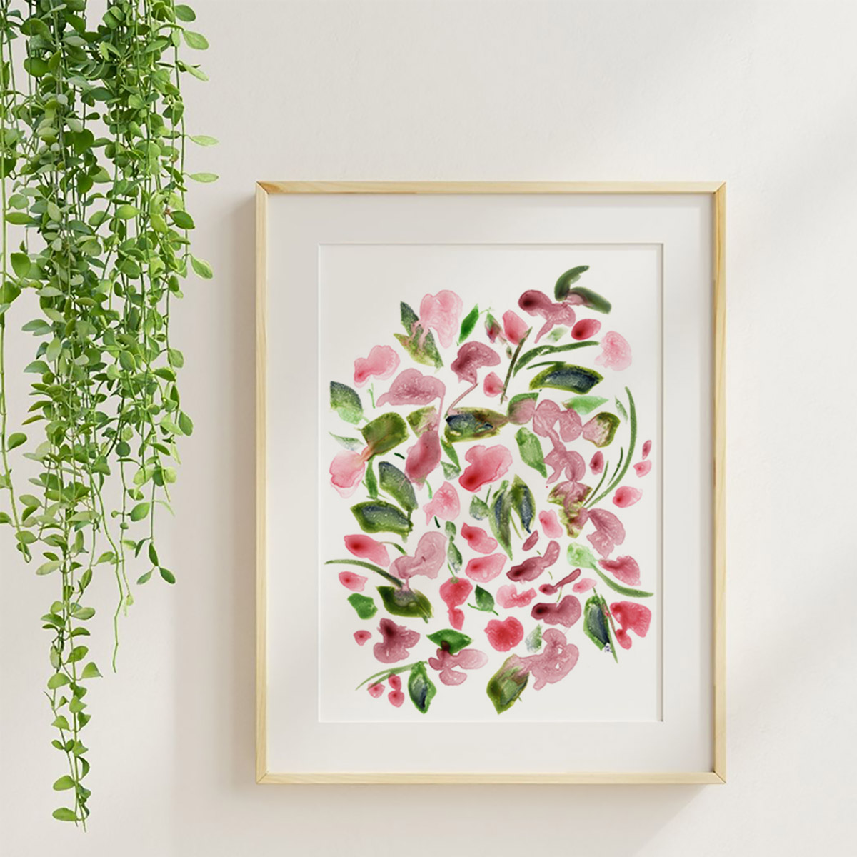 Floral Symphony, watercolor floral art print in a maple frame with soft neutral styling and greenery.