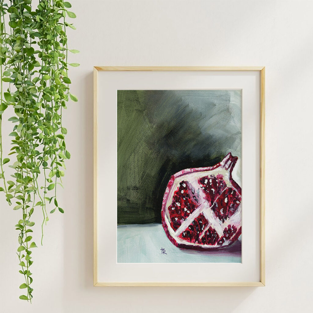 PomPom 2 acrylic fruit art print in a maple frame with soft neutral styling and greenery.