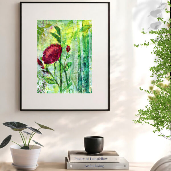 Framed acrylic floral art print styled in a bright reading nook with sunny window light.