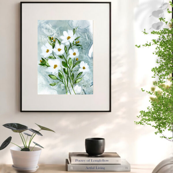 11x14 framed watercolor floral art print styled in a bright reading nook with natural light.