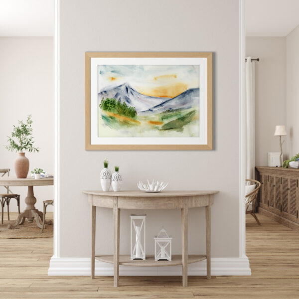 16x20 Mountain Sunset art print in a foyer, featuring a warm watercolor landscape with soft evening light.